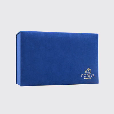 Blue Godiva chocolate gift box with gold logo from the Royal Gift Box collection