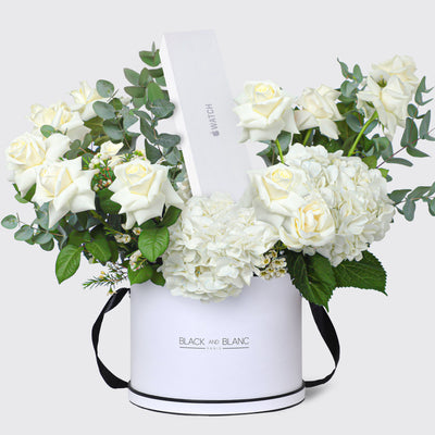 White floral arrangement in a box with black ribbon for Apple Watch Series 9 Hamper