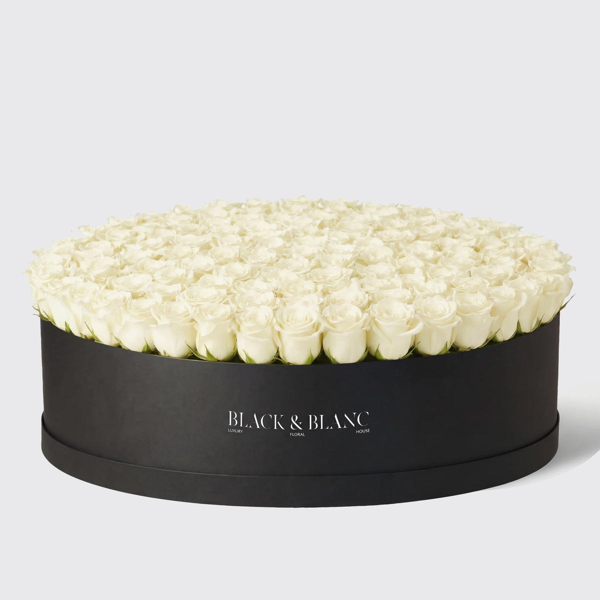 عرض الورود الكلاسيكية الفاخرة في صندوق