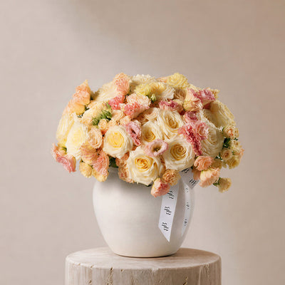 Fair Roses in Ivory Vase