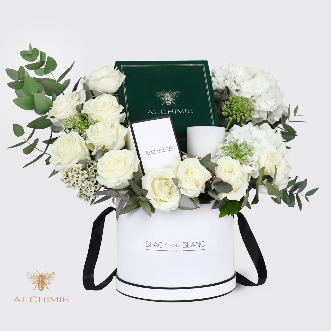 Elegant floral arrangement in a white box with white roses for Home Sweet Home