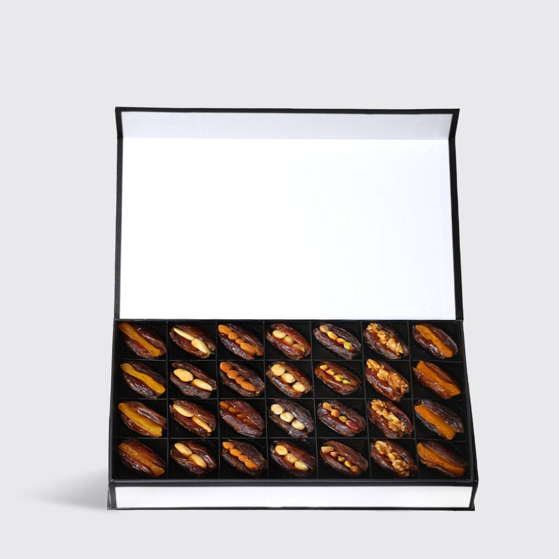 Nuts Stuffed dates Box of (28Pcs) - BLACK AND BLANC