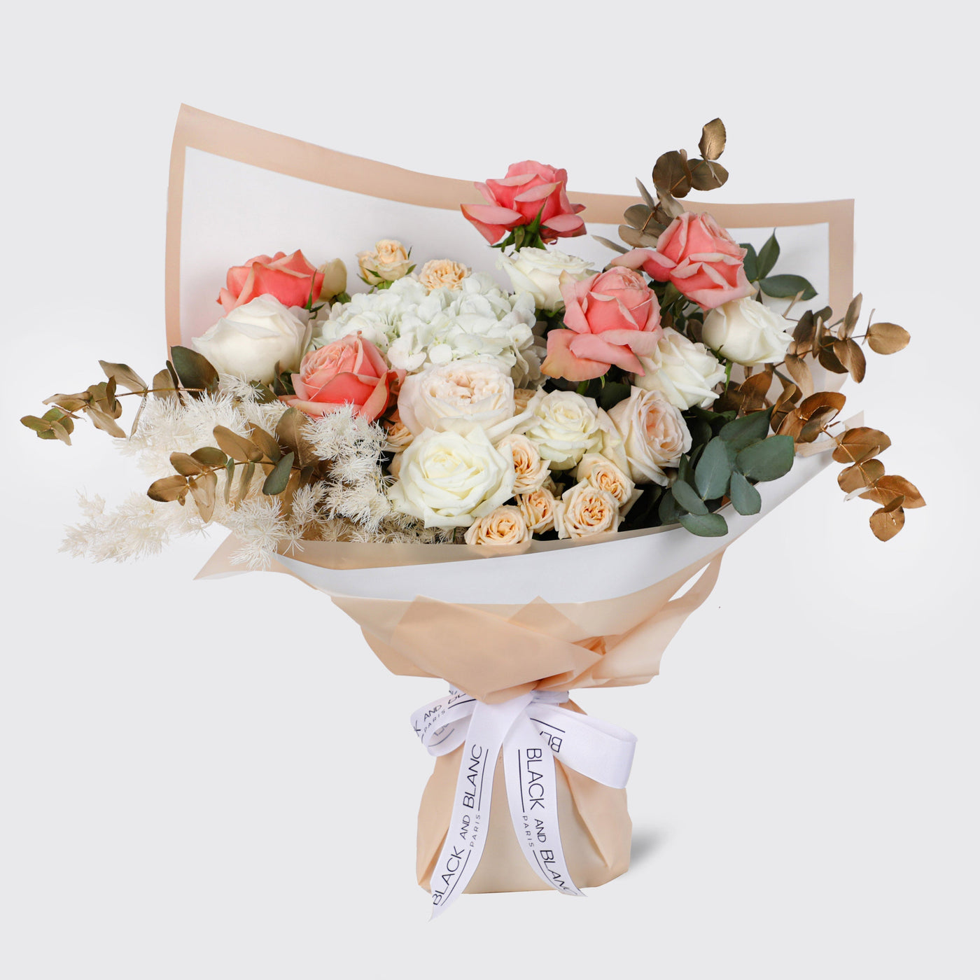 Elegant Peach Sorbet Bouquet featuring mixed roses and fresh flowers in stylish wrap