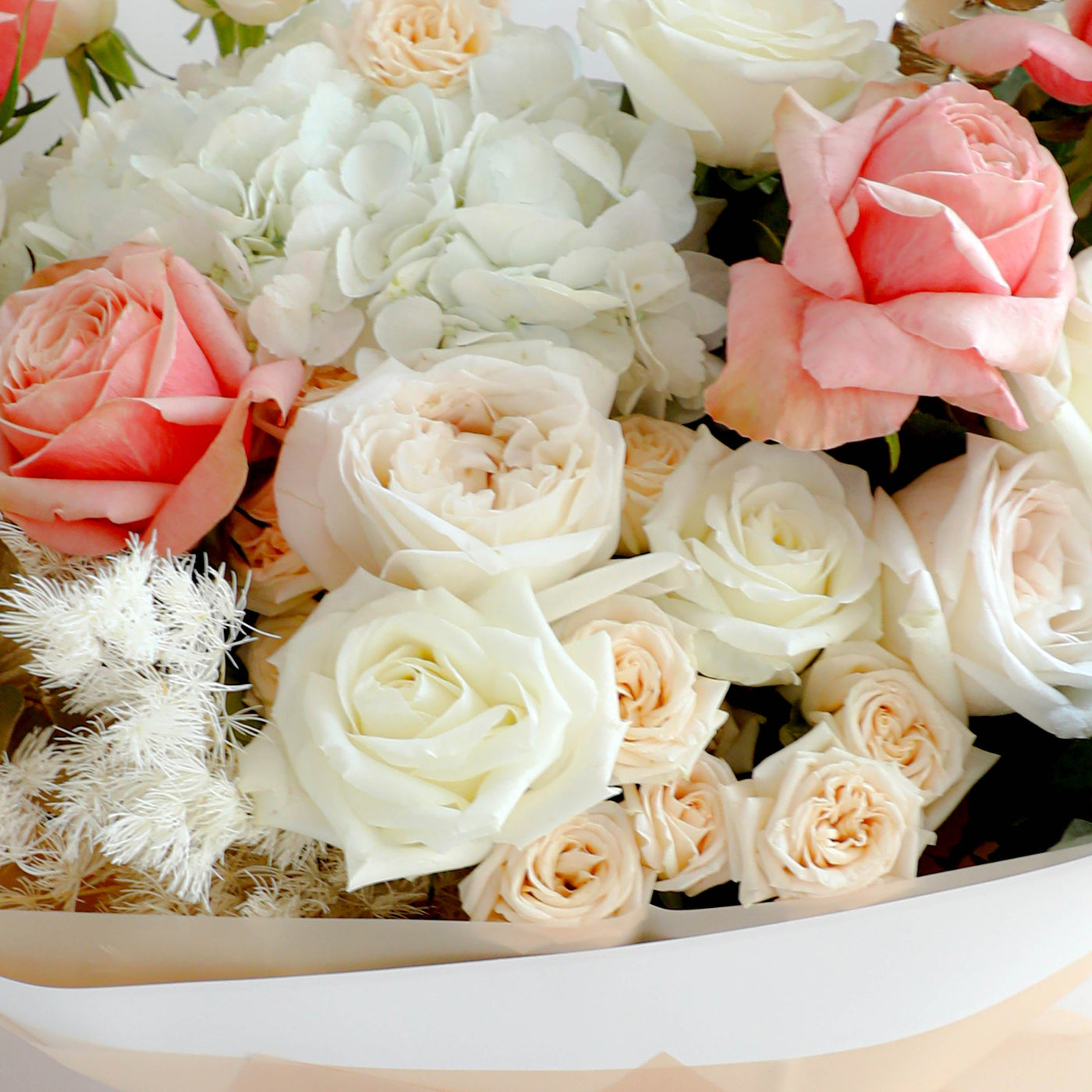 Peach Sorbet Bouquet featuring soft pink, white, and peach flowers in a stunning arrangement