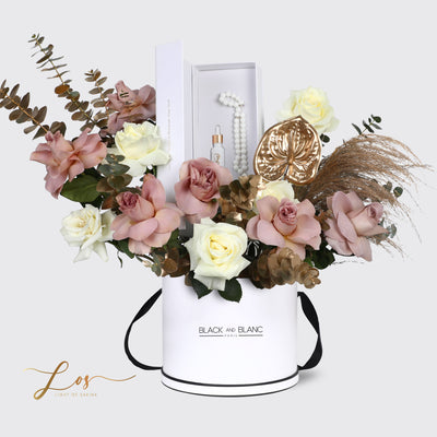 Elegant floral arrangement in a white box with BLANC EN BLANC for Scented Tranquility Assortment