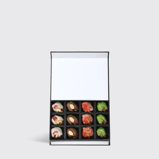 Stuffed dates dipped in Chocolate (12Pcs) - BLACK AND BLANC