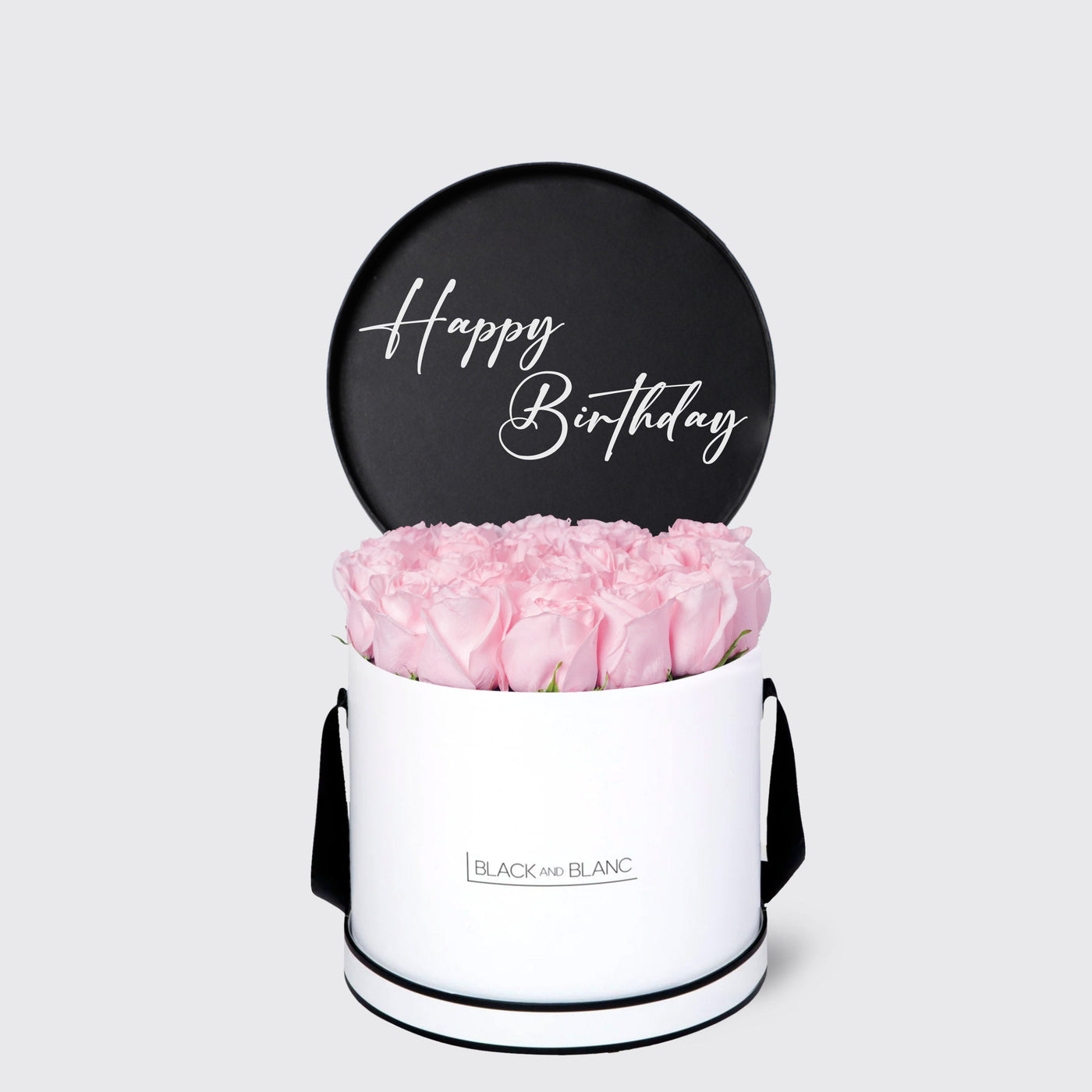 Elegant white box of pink roses with black Happy Birthday sign by Texte De Fleur