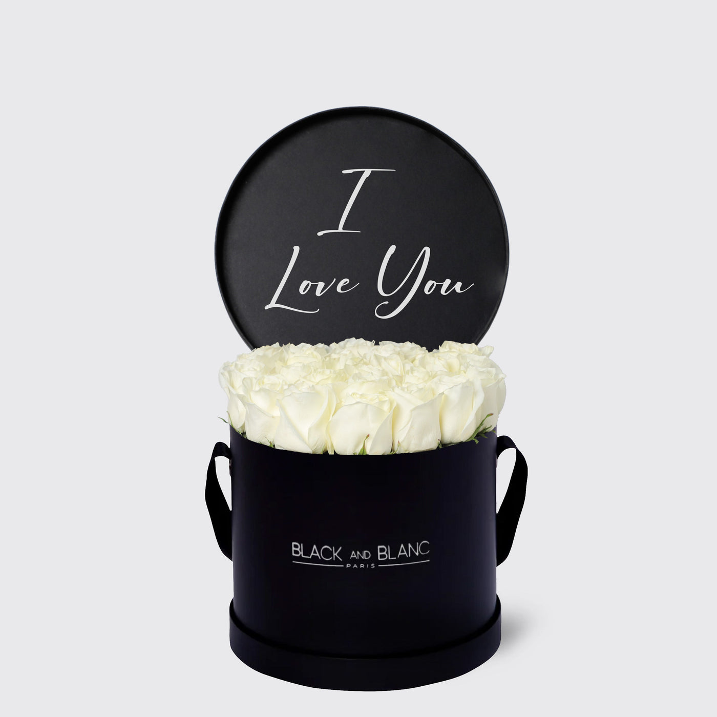 Elegant black box with white roses and a cute I Love You sign from Texte De Fleur