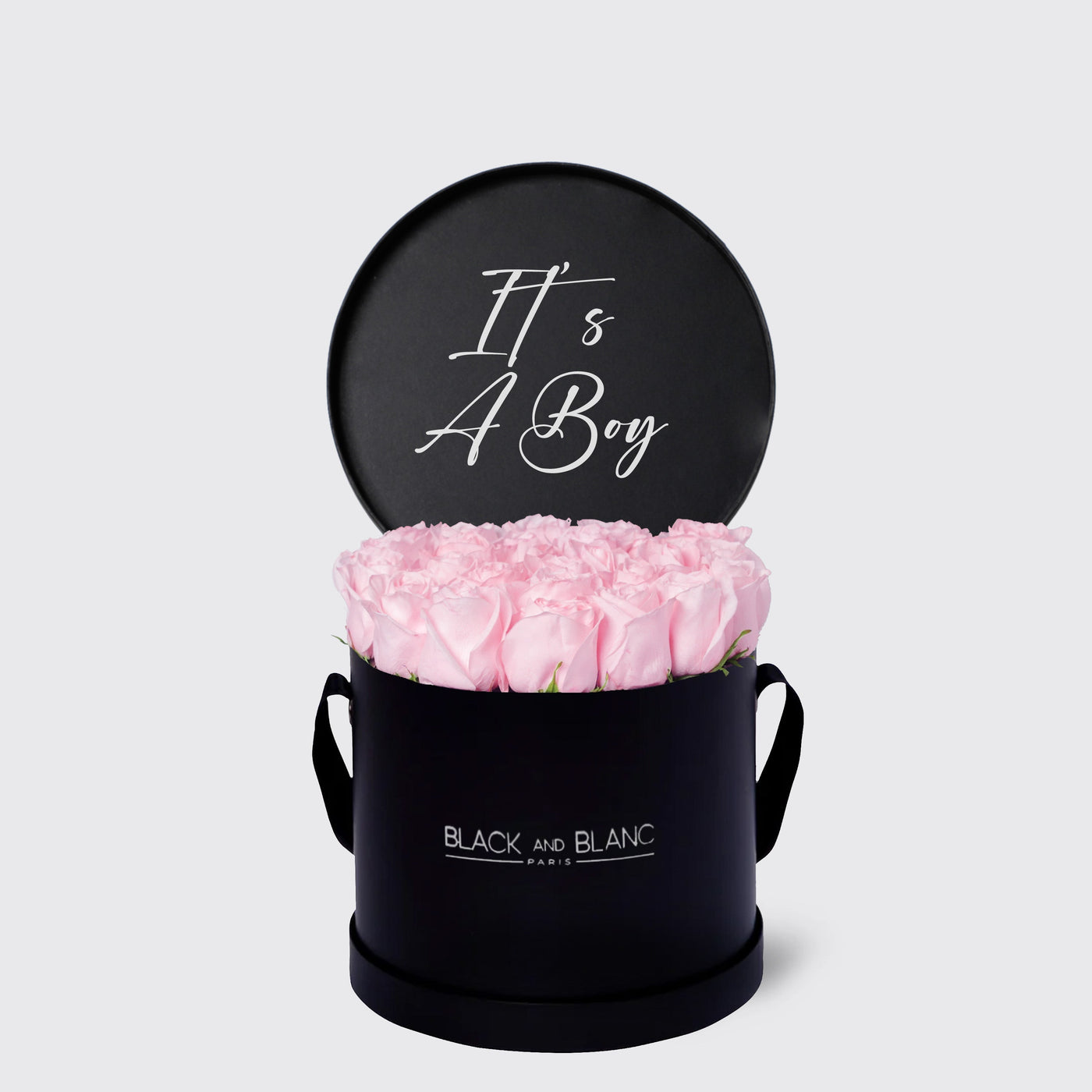 Circular black box with pink roses and It’s A Boy sign from Texte De Fleur