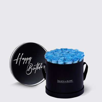 Circular black box with blue infinity roses and a Happy Birthday lid design