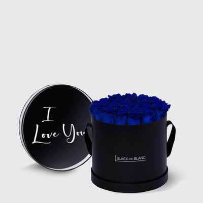 Circular black box with blue infinity roses and I Love You lid in white script