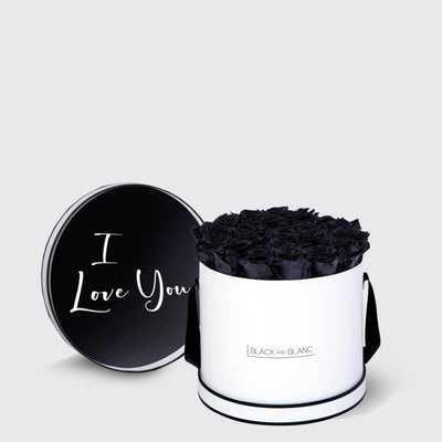 Cylindrical white box with black roses and lid saying I Love You, perfect for Infinity Roses