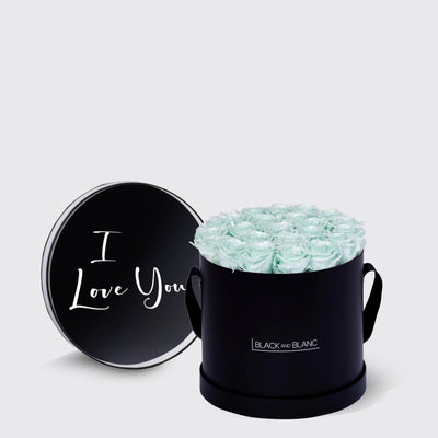 Circular black box with light blue infinity roses and I Love You lid design