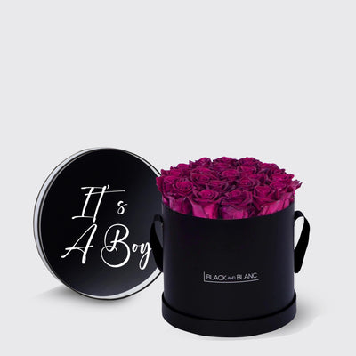 Circular black box of infinity roses with magenta blooms and It’s A Boy lid design