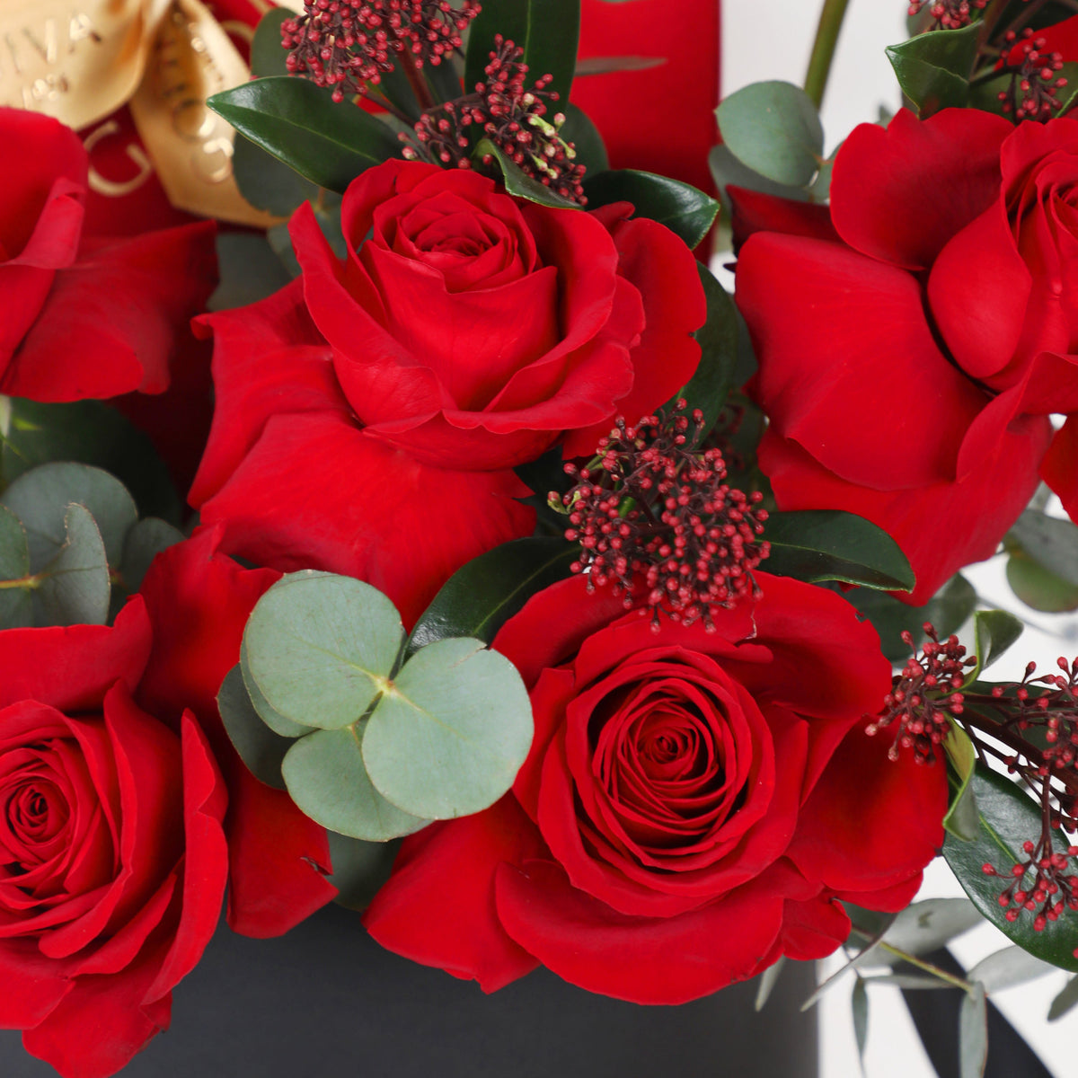 Velvet Heart Assortment Medium – red roses, eucalyptus and Godiva chocolate hearts