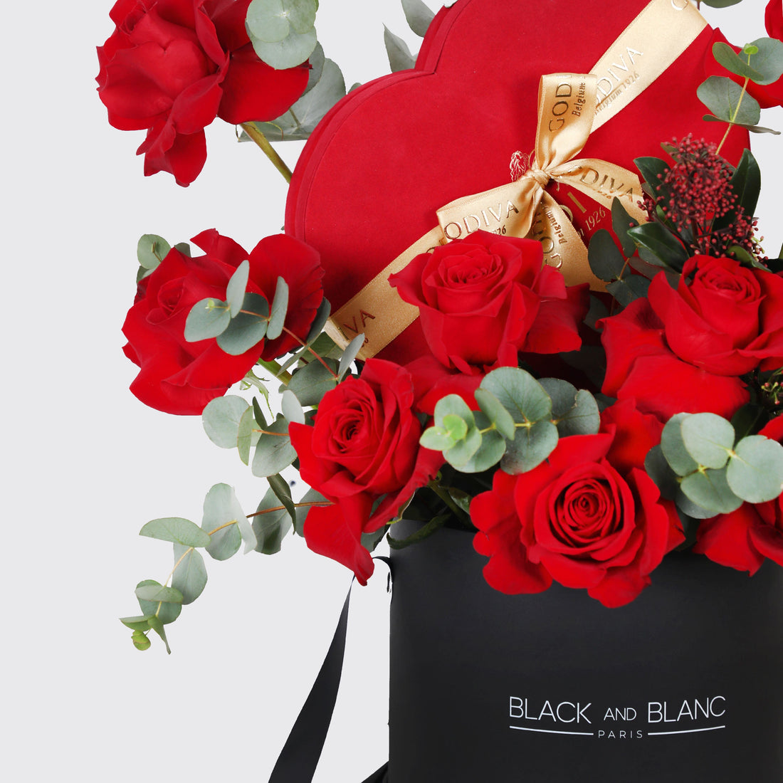 Velvet Heart Assortment Medium – red roses, eucalyptus and Godiva chocolate hearts