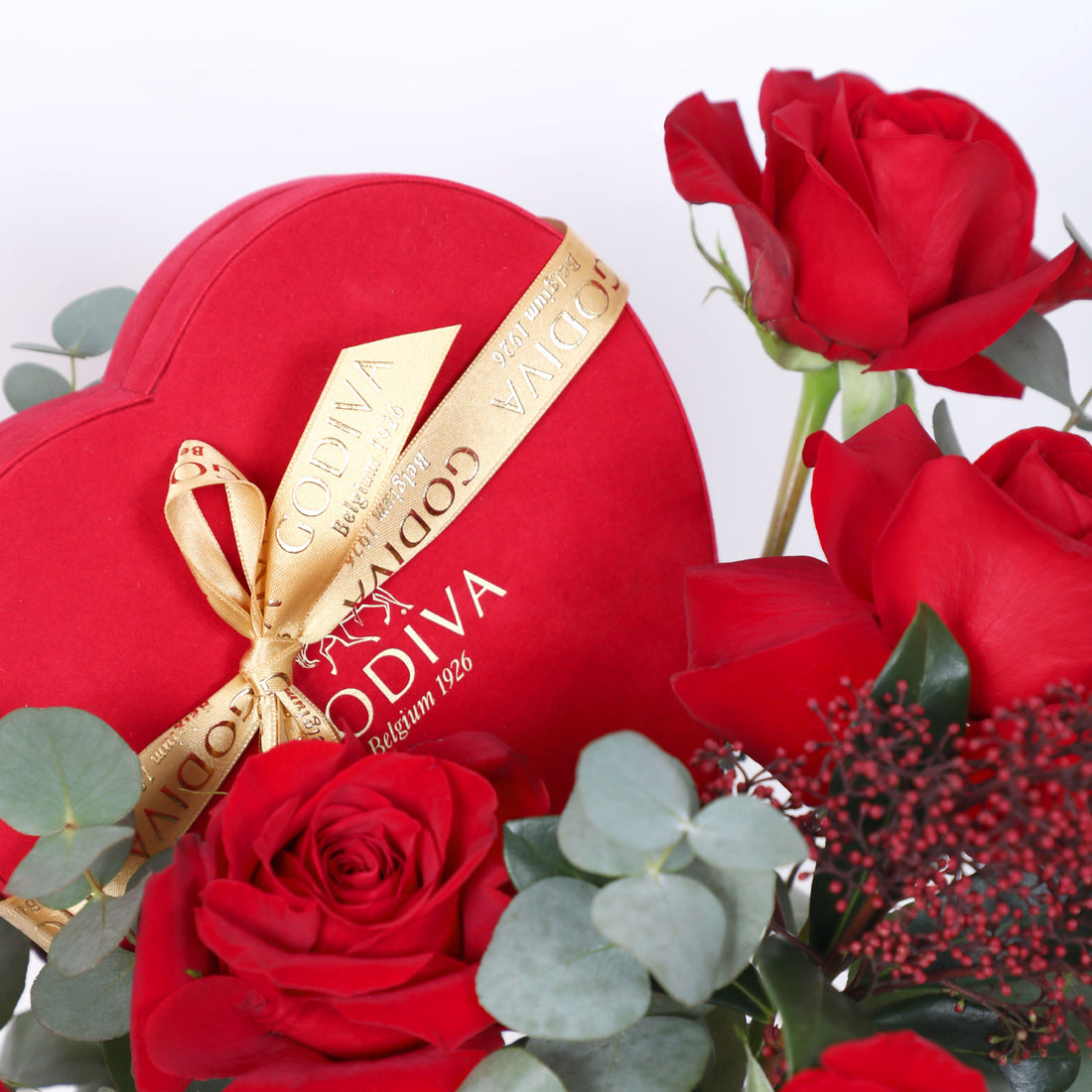 Heart-shaped red Godiva box with gold ribbon from the Velvet Heart Assortment