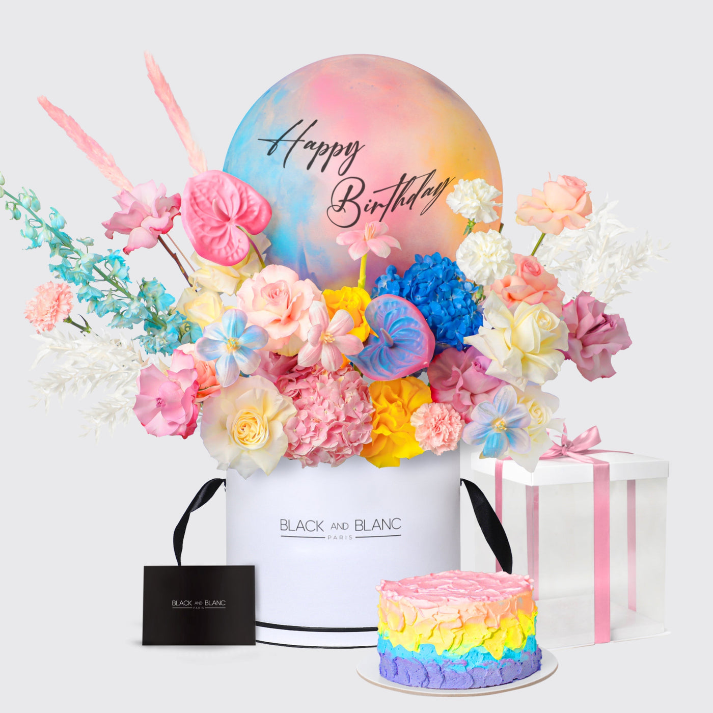 Colorful floral arrangement and cake in Vibrant Delice Birthday Set with a balloon