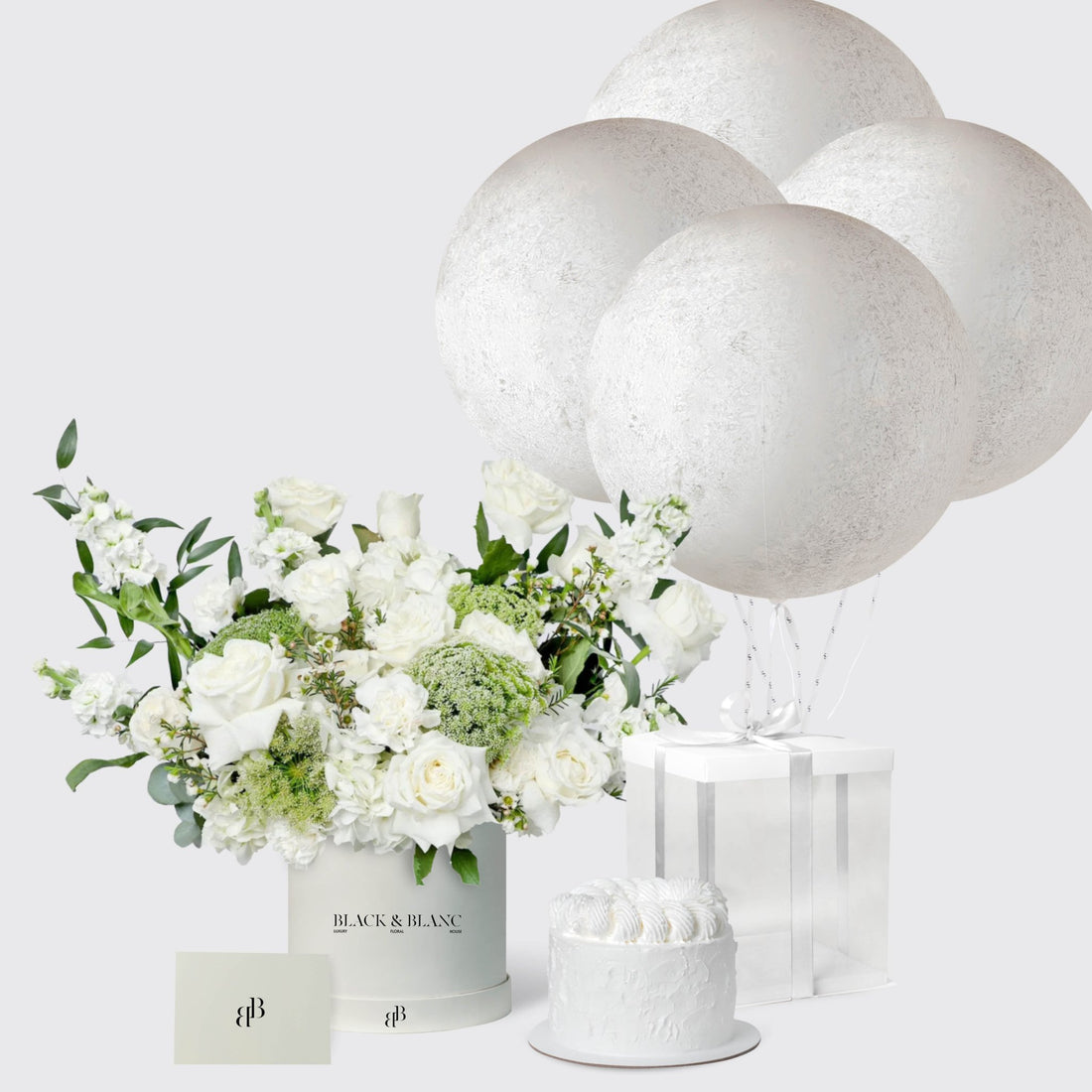 Whispering White with Cake and Balloons - BLACK AND BLANC