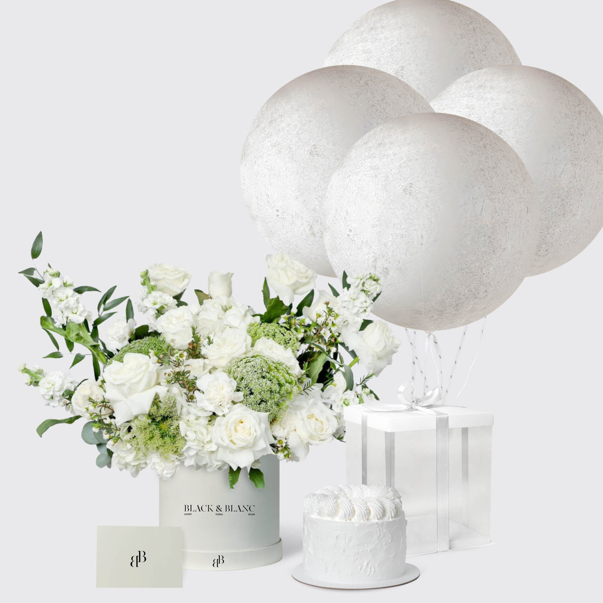 Whispering White with Cake and Balloons - BLACK AND BLANC